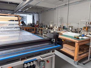 Our studio, with our CNC fabric cutter in the foreground