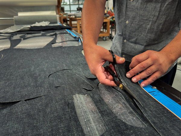 Steven cutting denim in our studio